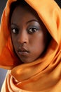 Beautiful young black girl wearing headress