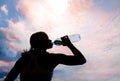 Beautiful young blond girl drinking water Royalty Free Stock Photo