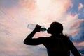 Beautiful young blond girl drinking water Royalty Free Stock Photo