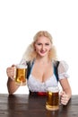 Beautiful young blond girl drinks out of oktoberfest beer stein Royalty Free Stock Photo