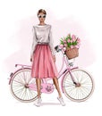 Beautiful young blond hair girl standing near bicycle. Fashion girl. Pretty woman in skirt. Girl in pink fluffy tulle skirt. Royalty Free Stock Photo