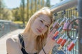 Beautiful young blond woman holding padlocks Royalty Free Stock Photo