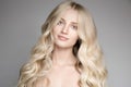 Beautiful Young Blond Woman With Long Wavy Hair. Royalty Free Stock Photo