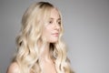 Beautiful Young Blond Woman With Long Wavy Hair. Royalty Free Stock Photo