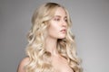 Beautiful Young Blond Woman With Long Wavy Hair. Royalty Free Stock Photo