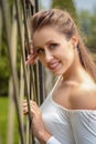 Beautiful young blond woman outdoors. Sunny day. Nature summer background. Outside close-up portrait of beautiful young happy Royalty Free Stock Photo