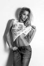 Beautiful young blonde girl jeans denim fashion style Royalty Free Stock Photo