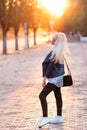 Beautiful young blonde girl with a pretty smiling face and beautiful eyes. Portrait of a woman with long hair and amazing looks. Royalty Free Stock Photo