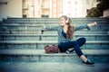 Beautiful young blonde hipster woman listening music Royalty Free Stock Photo