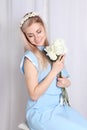 Beautiful young blonde woman with flower wreath Royalty Free Stock Photo