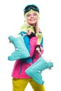 Beautiful young blonde woman in colorful snow coat hold snow boots Royalty Free Stock Photo