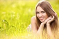 Beautiful young blonde woman on the meadow Royalty Free Stock Photo