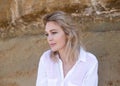 Beautiful young blondie woman portrait in white blouse Royalty Free Stock Photo