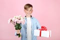 Young boy with eustoma flowers Royalty Free Stock Photo