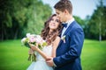 Beautiful young bride and groom going to kiss Royalty Free Stock Photo