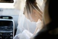 Beautiful young bride portrait in a car Royalty Free Stock Photo