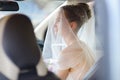 Beautiful young bride portrait in a car Royalty Free Stock Photo