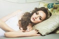 Beautiful Young Bride Sensualy Posing On Sofa. White Wedding Dress Royalty Free Stock Photo