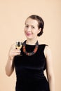 Beautiful young brunette woman holding a glass of white wine Royalty Free Stock Photo