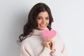 Woman holding pink paper heart Royalty Free Stock Photo