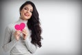 Woman holding pink paper heart Royalty Free Stock Photo