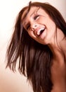 Beautiful young brunette woman laughing Royalty Free Stock Photo