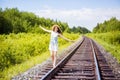 Beautiful young brunette woman on the meadow Royalty Free Stock Photo