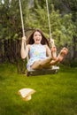 Beautiful young brunette woman on the meadow Royalty Free Stock Photo