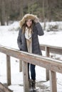 Beautiful young brunette woman in winter park Royalty Free Stock Photo