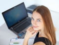 Beautiful young business woman in office Royalty Free Stock Photo