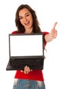 Beautiful young business woman showing laptop with screen for co Royalty Free Stock Photo