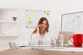 Beautiful young businesswoman making a call by mobile phone Royalty Free Stock Photo