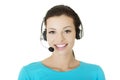 Beautiful young call-center assistant smiling