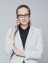 Beautiful young caucasian businesswoman talking on mobile phone. Royalty Free Stock Photo