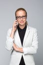 Beautiful young caucasian businesswoman talking on mobile phone. Royalty Free Stock Photo