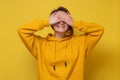 Beautiful young caucasian woman covering her eyesn with her hands waiting for surprise. Royalty Free Stock Photo