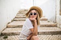 Beautiful young caucasian woman smiling in urban background. Blond girl wearing casual clothes in the street. Royalty Free Stock Photo