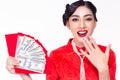 Beautiful young chinese woman hold red envelopes, money. Attractive beautiful asian girl get happiness, surprise when she get a Royalty Free Stock Photo