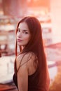 Beautiful young city woman portrait at sunset summer close