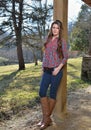 Beautiful young country girl on farm outdoors Royalty Free Stock Photo