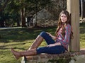 Beautiful young country girl on farm outdoors Royalty Free Stock Photo