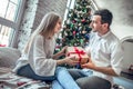 Beautiful young couple is celebrating at home Royalty Free Stock Photo