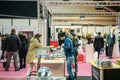 Beautiful young couple choosing wedding ring at Salon du Marriage wedding fair France