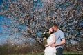 Beautiful young couple dancing and having fun on blue sky background Royalty Free Stock Photo