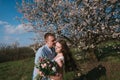 Beautiful young couple dancing and having fun on blue sky background Royalty Free Stock Photo