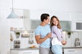 Beautiful young couple dancing in kitchen Royalty Free Stock Photo