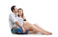 Beautiful young couple expecting baby. A happy family. Isolation on a white background. Pregnancy, childbirth.