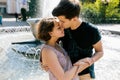 Beautiful young couple at the fountain Royalty Free Stock Photo