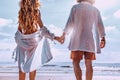 Beautiful young couple having fun on the beach Royalty Free Stock Photo