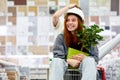 Beautiful young couple having fun while choosing things for home in the market Royalty Free Stock Photo